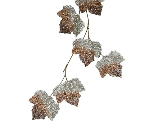 Decorative maple leaf Christmas branch with glitter and beads