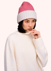 Emily Beanie - Coral by Powder worn by a model