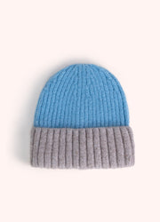 Emily Beanie - Denim by Powder showing the denim blue and grey ribbed knit
