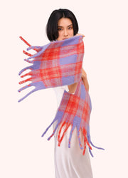 Flora Cosy Scarf - Tangerine Mix by Powder draped around the neck by a model