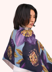 Hellebore Lux Print Scarf by Powder worn over a model's shoulders