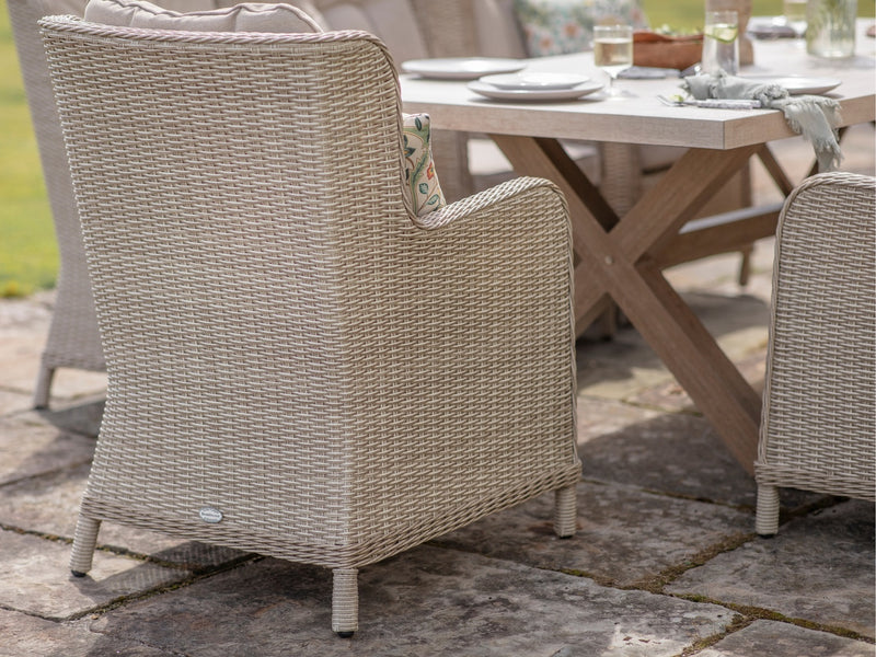 Chedworth Sandstone Ceramic Rectangle Table with 8 Rattan High Back Armchairs