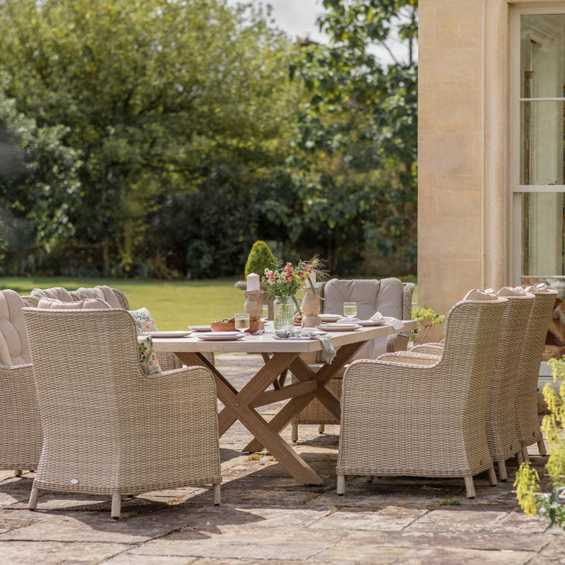 Chedworth Sandstone Ceramic Rectangle Table with 8 Rattan High Back Armchairs