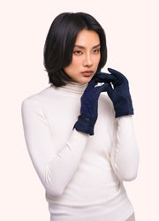 Penelope Gloves - Navy by Powder worn by a model
