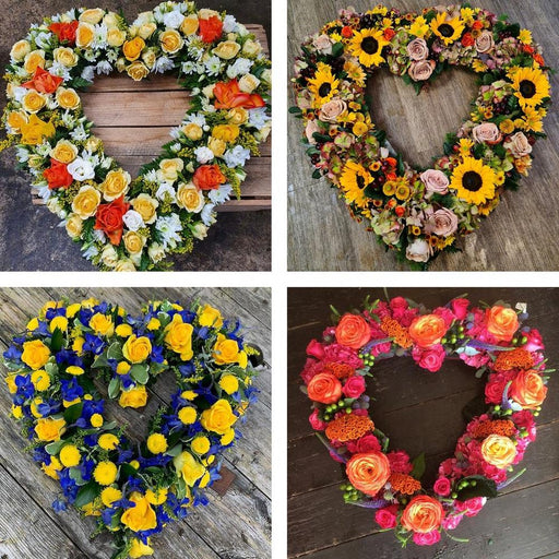 Funeral heart tribute in bright flowers — standard