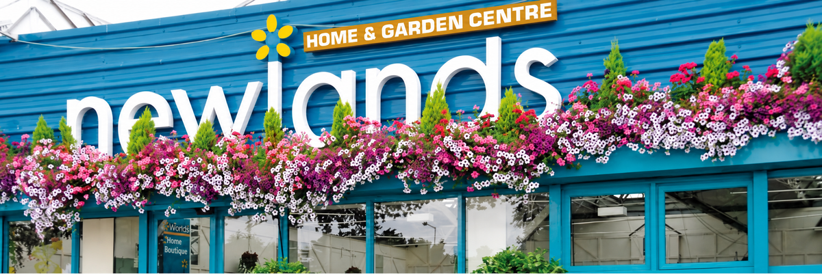 Newlands entrance with hanging flowers and a clearly visible Home & Garden Centre sign