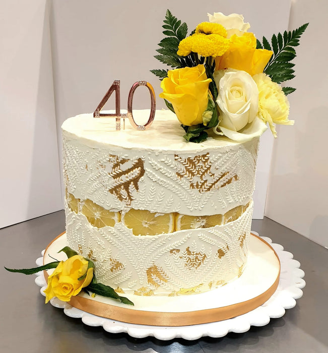 Bespoke Cake With Floral Pattern and Floral Top