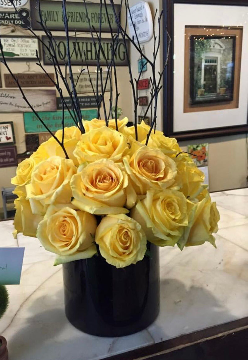 Lemon Yellow Rose Arrangment in a Black Cylinder Vase